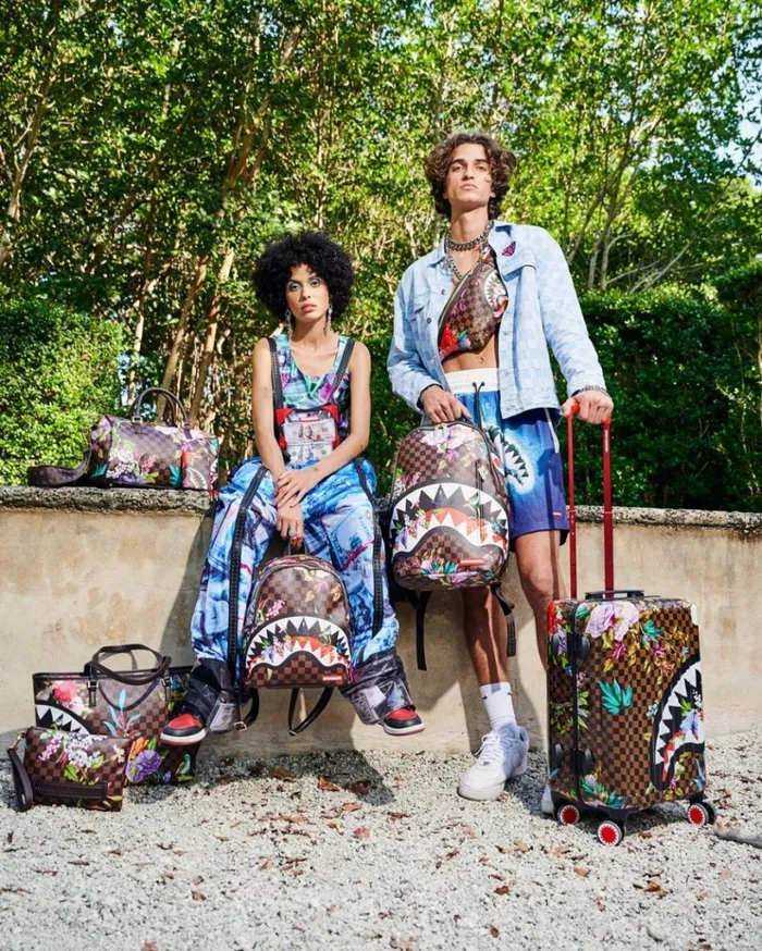SPRAYGROUND GARDEN OF SHARKS CROSSOVER CLUTCH Bags